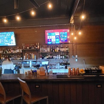 Black Rooster - two men sitting at the bar - Italian Near Me - West Columbia, South Carolina