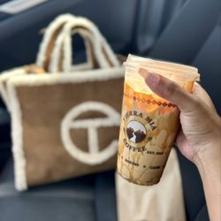 Tierra Mia Coffee - Iced vanilla latte with caramel and oat milk