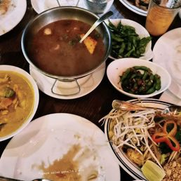 Top to bottom: bamboo shoot and eggplant stir fry with mock chicken, tom yum with tofu, yellow curry with chicken, pad Thai veggie/tofu