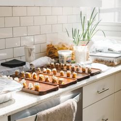 Mint Julep Catering - Catering prep, plated hors d'oeuvres, behind-the-scenes kitchen setup.
