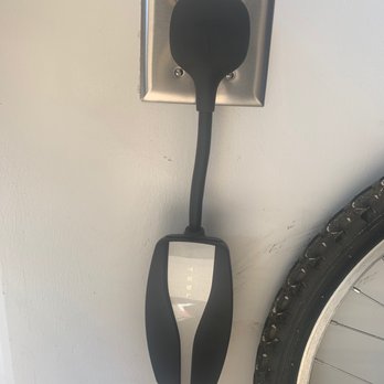 Wired Up Electrical Services - Tesla fast charger installed in less than 30 min - Electricians Near Me