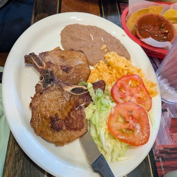 Esmeralda's Restaurant - Monday special - pork chops with refried beans & Mexican rice, $9.99. - Mexican Near Me - San Antonio, Texas Esmeralda's Restaurant - Monday special - pork chops with refried beans & Mexican rice, $9.99. - Mexican Near Me - San Antonio, Texas