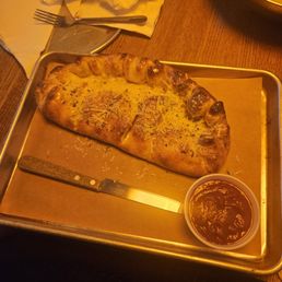 The Calzone was a decent size and ended up being good. The Calzone was a decent size and ended up being good.