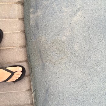 Cal Plastering - a person standing on a sidewalk - General Contractors Near Me - Phoenix, Arizona