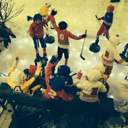 Christmas Presence - Window display - elves playing hockey!