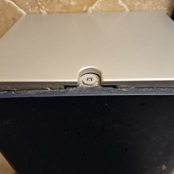 La Luna Italian Bistro - Dusty and dirty paper towel dispenser. - Italian Near Me - Boca Raton, Florida