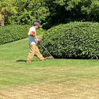 Gomez Lawn Care - a man mowing the lawn - Lawn Services Near Me Gomez Lawn Care - a man mowing the lawn - Lawn Services Near Me