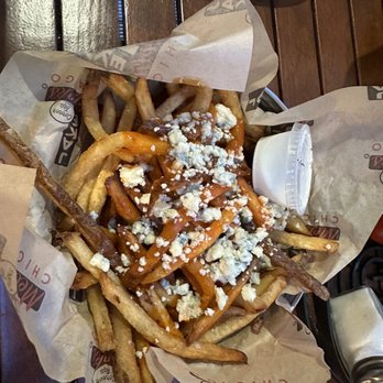 Jake Melnick's Corner Tap - Fries with blue cheese - Sports Bars Near Me - Chicago, Illinois Jake Melnick's Corner Tap - Fries with blue cheese - Sports Bars Near Me - Chicago, Illinois