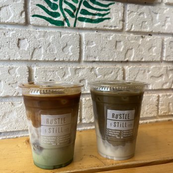 Rustle & Still Café - Left: iced pandan latte w/ oat milk Right: iced hojicha latte w/ oat milk - Coffee & Tea Near Me - Toronto, Ontario Rustle & Still Café - Left: iced pandan latte w/ oat milk Right: iced hojicha latte w/ oat milk - Coffee & Tea Near Me - Toronto, Ontario