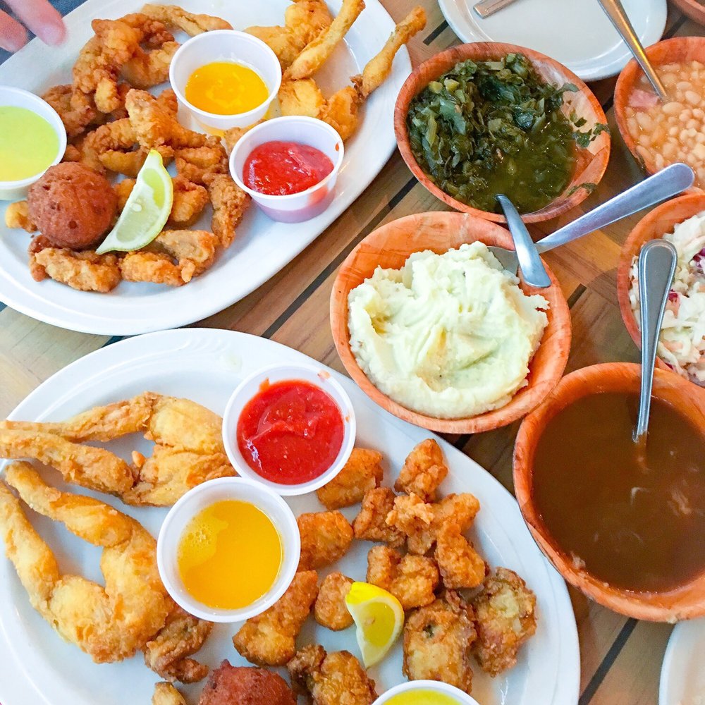 Cracklin' Jack's - Frog gator & oyster plate... just a few of the many "vittles" shown on the side - Seafood Near Me - Naples, Florida