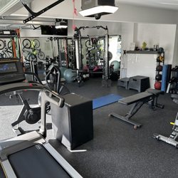 Rich Roe Personal Training - Garage gym: treadmill, cables, squat rack, benches, plyo boxes, mats, stability ball...