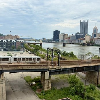 The Finch - View of buildings, river, and train from my table - Cocktail Bars Near Me - Pittsburgh, Pennsylvania The Finch - View of buildings, river, and train from my table - Cocktail Bars Near Me - Pittsburgh, Pennsylvania