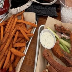 Pilot House Restaurant - Ribs (half eaten. Weird photo) and sweet potato fries