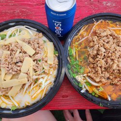 Laos khaopoon on left Kao soi on thr right. Delicious