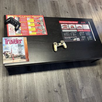 Protech Auto - Coffee table with magazines and the sticks - Auto Repair Near Me - North Highlands, California Protech Auto - Coffee table with magazines and the sticks - Auto Repair Near Me - North Highlands, California