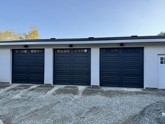Fresh Install: 3 Custom-Size CHI Steel-Back Doors - Ryan's garage doors new installation - 3 custom-size garage doors, each 9’ wide x 8’7” high. Customer wanted a clean, modern look with added insulation, so we installed CHI steel-back insulated doors with tinted glass.

Scope of work included removal of existing doors, installation of new track/hardware and torsion spring system, full alignment, balance and safety adjustments, new perimeter sealing as needed, and final operational testing to ensure smooth, quiet, and reliable performance.
