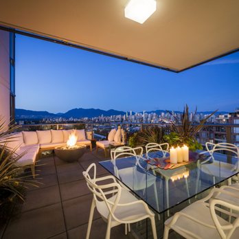 Rodrozen Design & Build - a patio with a view of the city - Interior Design Near Me - Vancouver, British Columbia Rodrozen Design & Build - a patio with a view of the city - Interior Design Near Me - Vancouver, British Columbia
