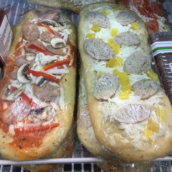 Spolumbo's - two sub sandwiches in a refrigerator - Delis Near Me - Calgary, Alberta Spolumbo's - two sub sandwiches in a refrigerator - Delis Near Me - Calgary, Alberta