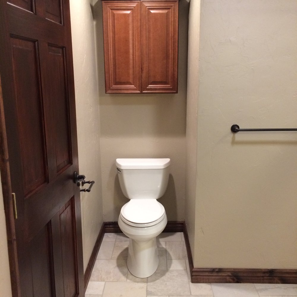 Blue River Contracting - Newly stained door.  Toilet install complete. - General Contractors Near Me - Breckenridge, Colorado