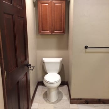 Blue River Contracting - Newly stained door.  Toilet install complete. - General Contractors Near Me - Breckenridge, Colorado