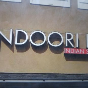 Tandoori Hut - Sign above front door - Indian Near Me - Airdrie, Alberta Tandoori Hut - Sign above front door - Indian Near Me - Airdrie, Alberta
