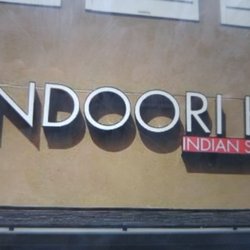 Tandoori Hut - Sign above front door