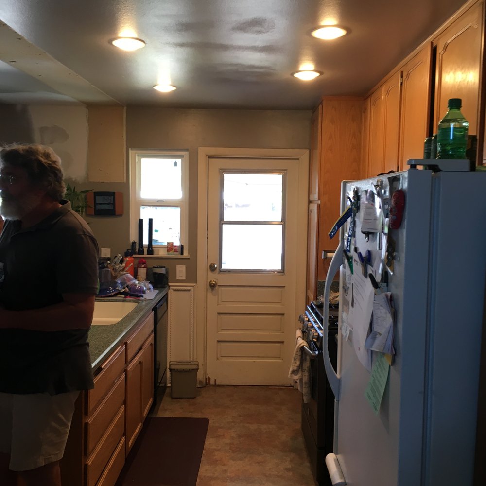 Cornerstone Remodeling - View from the hallway, pre-remodel - General Contractors Near Me
