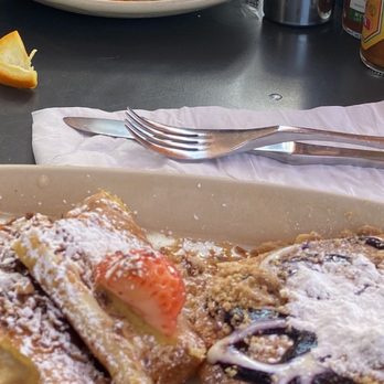 Snooze, an A.M. Eatery - Pancake flight w/OMG french toast, blue danish & chocolate chip. Shrimp grit in the back. - Breakfast & Brunch Near Me - Orange, California Snooze, an A.M. Eatery - Pancake flight w/OMG french toast, blue danish & chocolate chip. Shrimp grit in the back. - Breakfast & Brunch Near Me - Orange, California