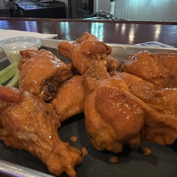Locals Restaurant & Pub - Dozen Buffalo wings. Very delicious. Great sauce. Perfectly crispy and saucy. Excellent paired dressings. $15.99. - Burgers Near Me - North Hampton, New Hampshire Locals Restaurant & Pub - Dozen Buffalo wings. Very delicious. Great sauce. Perfectly crispy and saucy. Excellent paired dressings. $15.99. - Burgers Near Me - North Hampton, New Hampshire