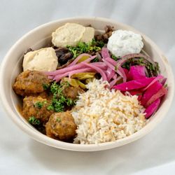 Shawarma District - Delicious falafel bowl with your choies of sauces!
