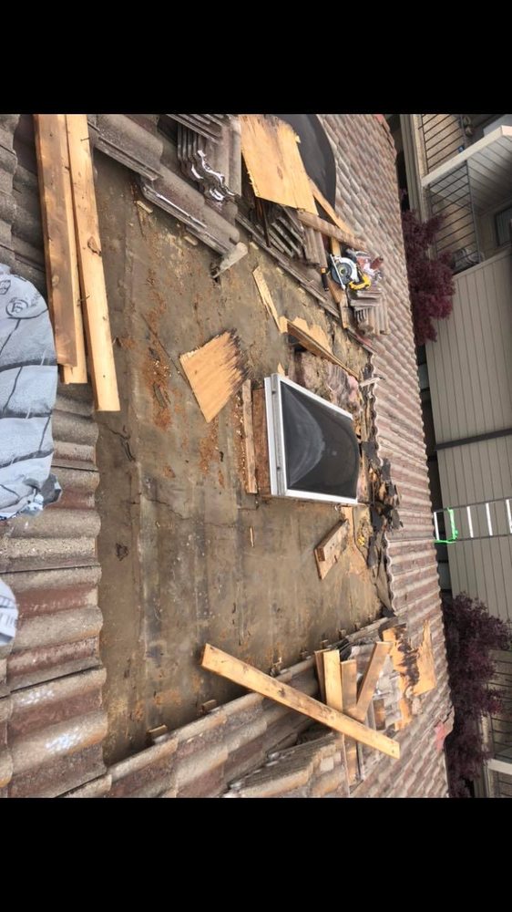 Slide of D Campos Roofing