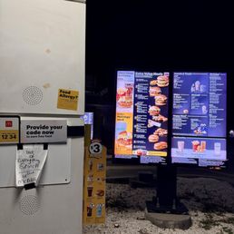 These signs were placed on both sides of the drive thru last night at 10pm. I waited & waited, nobody acknowledged my presence. These signs were placed on both sides of the drive thru last night at 10pm. I waited & waited, nobody acknowledged my presence.