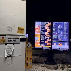 McDonald's - These signs were placed on both sides of the drive thru last night at 10pm. I waited & waited, nobody acknowledged my presence.