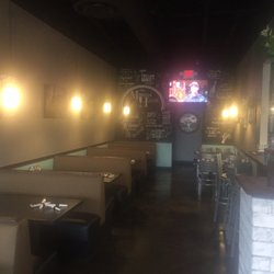 The Mimosa House - Booth seating tv nfl program