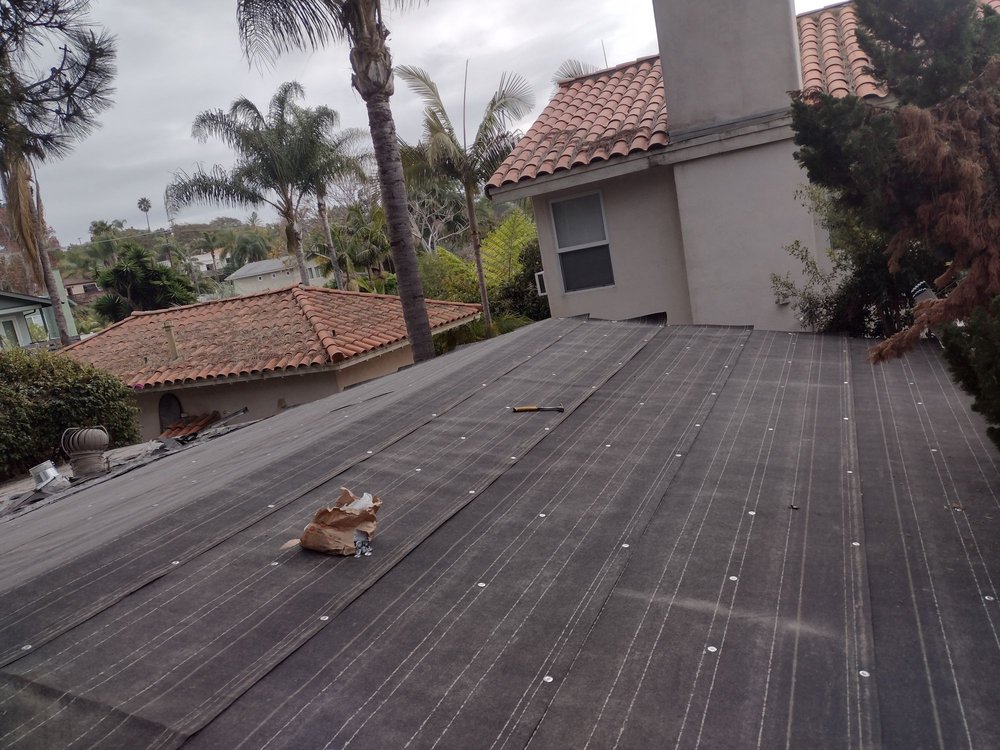 Slide of Mendez roofing