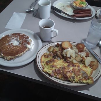 Central Cafe - My meat lovers omelet with pancakes - Cafes Near Me - Marshfield, Wisconsin
