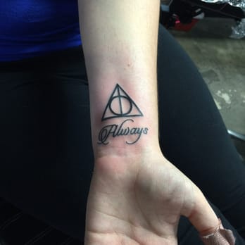 The Corner Tattoo & Piercing Studio - Deathly Hallow done by Liat. She was an incredible artist to work with, and I would highly recommend her to anyone looking for a new piece. - Piercing Near Me - Cocoa Beach, Florida The Corner Tattoo & Piercing Studio - Deathly Hallow done by Liat. She was an incredible artist to work with, and I would highly recommend her to anyone looking for a new piece. - Piercing Near Me - Cocoa Beach, Florida