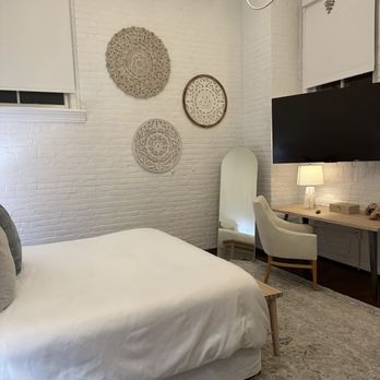 Fire Station One Boutique Hotel - Room 6. Very lovely. High ceilings, exposed brick. Motorized blinds. Large TV and sitting area. - Venues & Event Spaces Near Me - Roanoke, Virginia