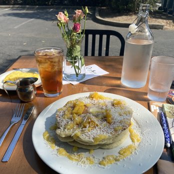 Orphan - Mango coconut pancakes with passionfruit iced tea! - Breakfast & Brunch Near Me - Sacramento, California Orphan - Mango coconut pancakes with passionfruit iced tea! - Breakfast & Brunch Near Me - Sacramento, California