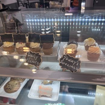 Midnite Confection's Cupcakery - The daily flavors in the display case - Bakeries Near Me - Baltimore, Maryland