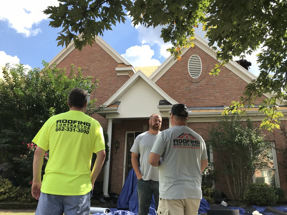 Slide of Ultimate Roofing