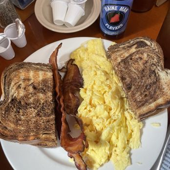 Jordans Restaurant - Bacon, eggs, and rye bread (part of the deal with pancakes) - Breakfast & Brunch Near Me - Bar Harbor, Maine Jordans Restaurant - Bacon, eggs, and rye bread (part of the deal with pancakes) - Breakfast & Brunch Near Me - Bar Harbor, Maine