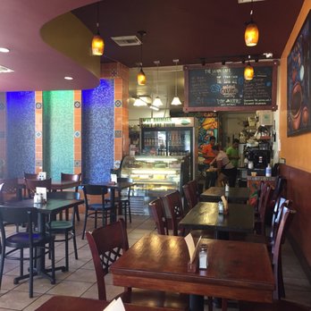 The Grain Cafe - Lots of vegan cakes and brownies in the desserts case. - Vegan Near Me - Long Beach, California