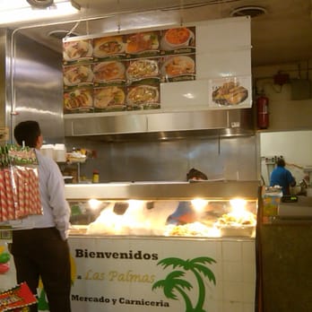 Las Palmas Mercado - a man in a restaurant - Grocery Near Me - San Jose, California Las Palmas Mercado - a man in a restaurant - Grocery Near Me - San Jose, California