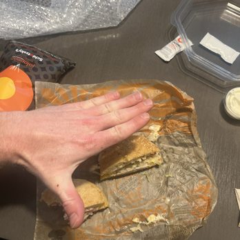 Schlotzsky's - My hand is tiny by the way. - Delis Near Me - Salina, Kansas Schlotzsky's - My hand is tiny by the way. - Delis Near Me - Salina, Kansas