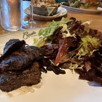 Capons Chophouse - Skirt steak well done with salad. The meal also comes with fries, so I asked without it. - American Near Me - Hackensack, New Jersey