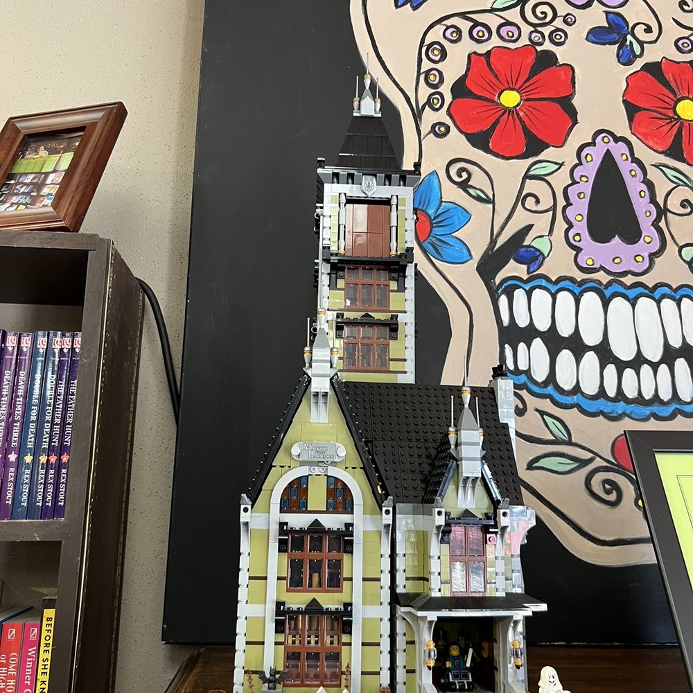 Murder by the Book - Lego bookstore, sugar skull behind - Bookstores Near Me - Houston, Texas Murder by the Book - Lego bookstore, sugar skull behind - Bookstores Near Me - Houston, Texas