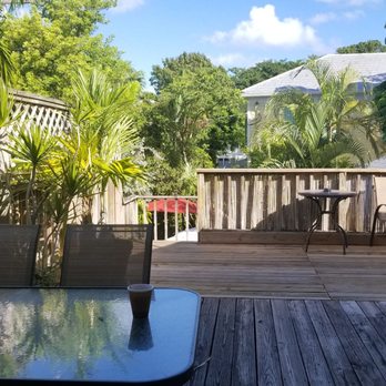 Authors Guest House - Outdoor deck by our room - Hotels Near Me - Key West, Florida Authors Guest House - Outdoor deck by our room - Hotels Near Me - Key West, Florida