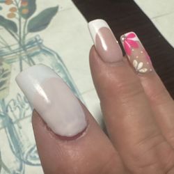 Sun Nails & Spa - She tried to make both pointers look alike. Oh, they look alike. OK both look horrible!! never again!!!