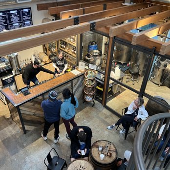 Oaklore Distilling - a group of people at a bar - Distilleries Near Me - Matthews, North Carolina